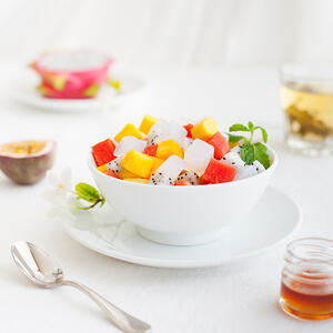 put the cut fruits in a bowl