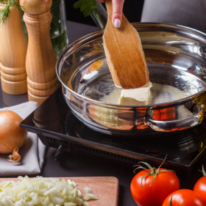  a cube of butter in a pan