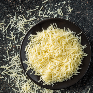 Add the grated cheese. 