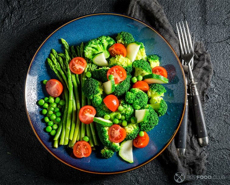 2022-11-09-fhxdtk-broccoli-salad-with-cherry-tomatoes-and-asparagus