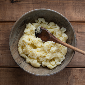 Mash the potatoes and season to taste.