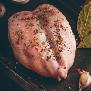 Cut the chicken breast into cubes, add spices