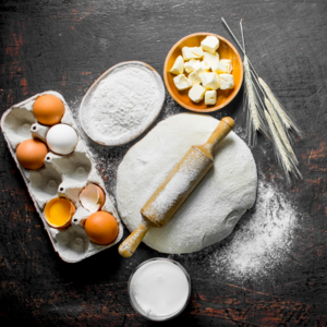 Press the flour again on the counter, on the dough, on the rolling pin and spread it into a large sheet