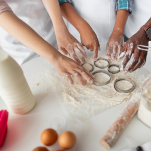 With a round cutter, cut small discs from the dough.