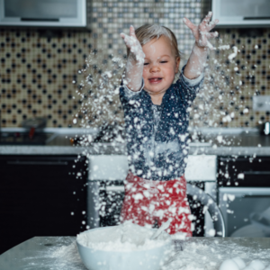 Sprinkle some flour on a kitchen counter.