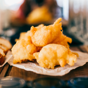 Add the round dough pieces and fry them.