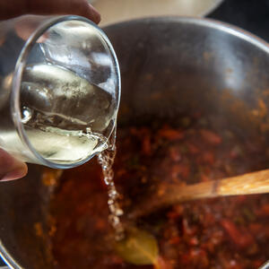 Add 5 teaspoons of wine 