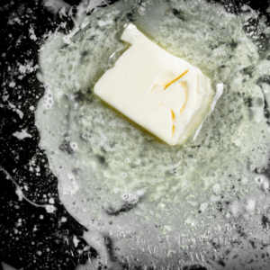 We put the butter in a pan and let it melt