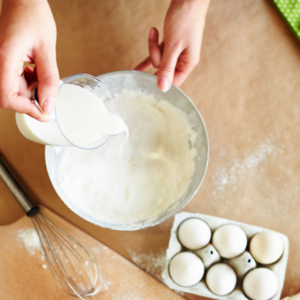 In a clean bowl, mix milk at room temperature, egg