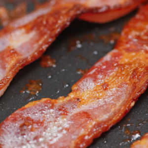 add the bacon and fry it for a few minutes until it takes on a little color.