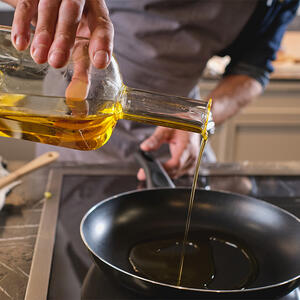 pour the oil on a frying pan