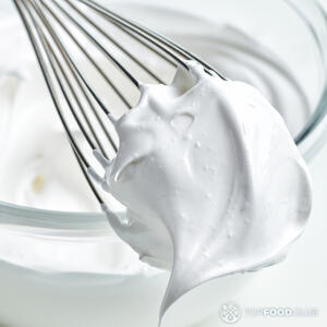 Mashed banana mix with foamed eggs and sugar