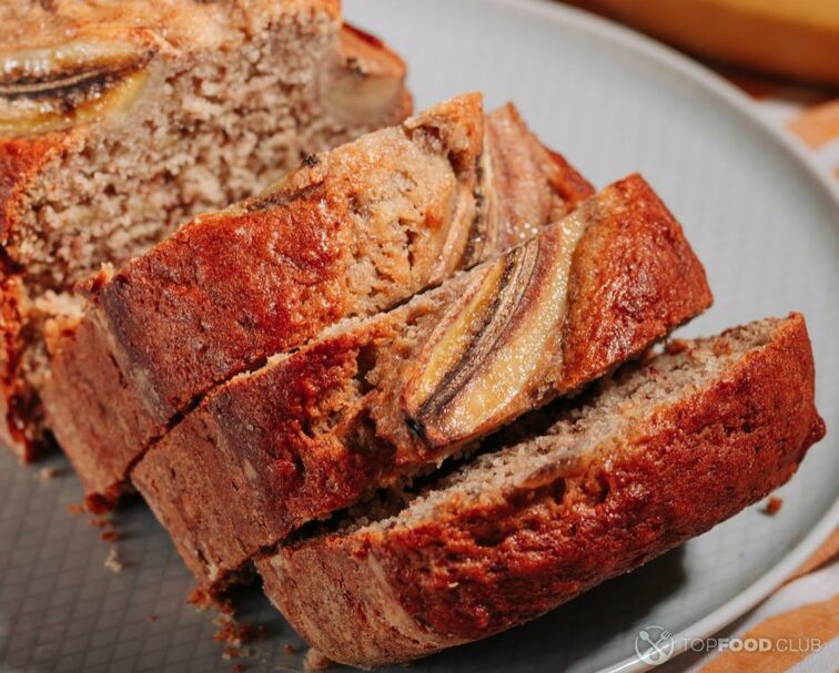 2022-11-28-bq654w-sliced-homemade-banana-bread-on-a-plate-2022-11-09-20-22-06-utc-1