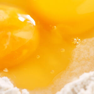 Mash bananas with eggs, jogurt and coconut oil