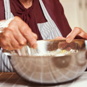 Add the sour cream, nuts and flour.