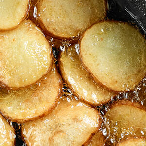Peel, cut and  fry potatoes.