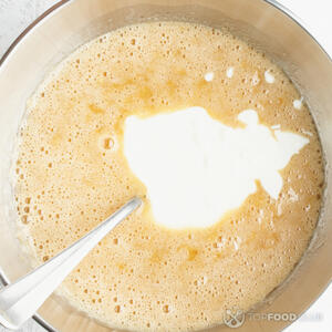 Beat the butter and sugar, then stir the beaten eggs and milk in.