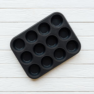 grase the muffin tin
