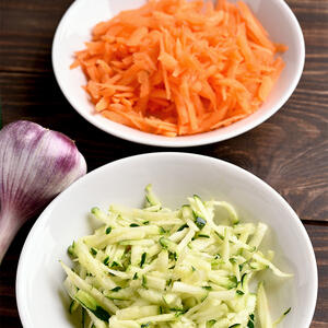 grate the carrots and cabbage