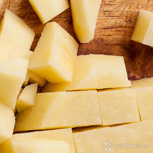 Peel and dice the potatoes