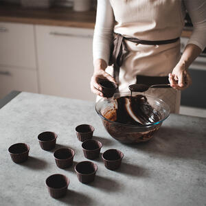 filling the cupcake molds