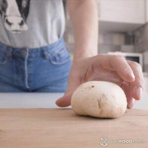 Separate the mushroom caps from the stalks. 