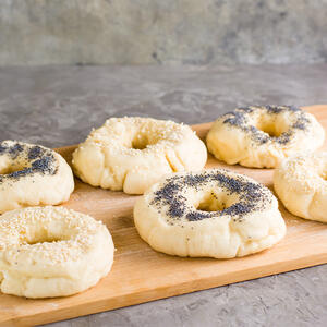 dip the bagels in poppy and sesame seeds