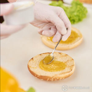 spread mustard on buns