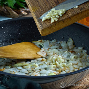 Fry the onion and garlic