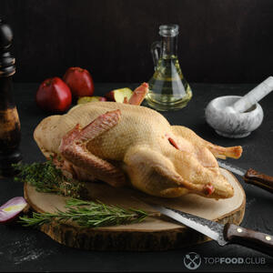 remove giblets from inside of the duck