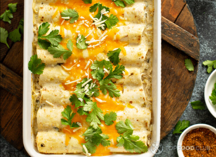 2023-06-29-xd5g8w-green-enchiladas-casserole-in-a-baking-dish-2023-05-03-22-37-33-utc