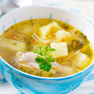 Chicken noodle soup with potatoes and garlic