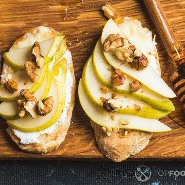 Stilton on toast with pickled pears