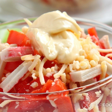 Imitation crab salad with tomatoes and pepper