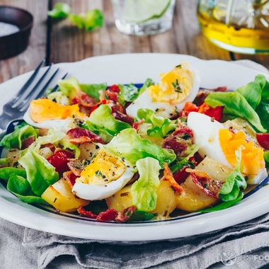Egg salad with potato and bacon