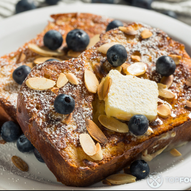 Homemade Brioche with Blueberries and Almond Flakes