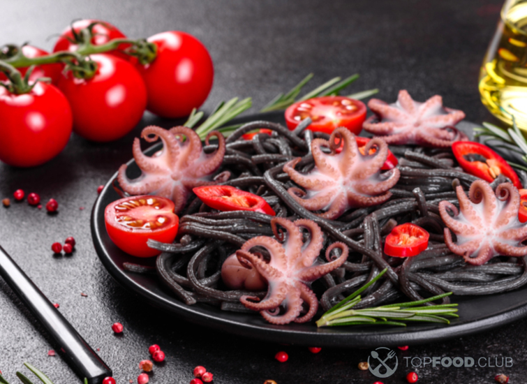 Черная паста с осьминогами и помидорами
